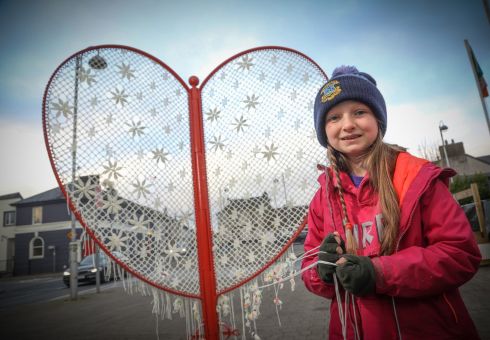 HEADFORD LACE: Lacemaker Gráinne Ní Bhroin with the new Lace Matrix sculpture in Headford, Co Galway. Drawing on Headford’s lacemaking heritage, it was made using traditional techniques of bobbin lacemaking, dating back to the 1750s. Local people ranging in age from 10-80 used 2km of cord in a six-day marathon outdoor lacing event organised by Headford Lace Project and funded by Galway 2020, European Capital of Culture. Headford lacemaking was recently awarded intangible cultural heritage status. Photograph: Aengus McMahon

