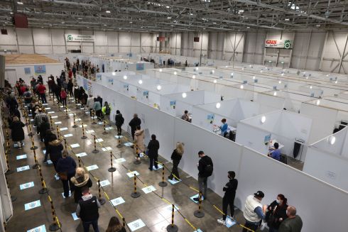 BOOSTERS: Healthcare workers queue to receive their Covid-19 booster vaccination at the National Show Centre in Swords, Co Dublin. Photograph: Dara Mac Dónaill