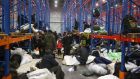 Poland accuses Belarus of transporting hundreds of migrants back to border