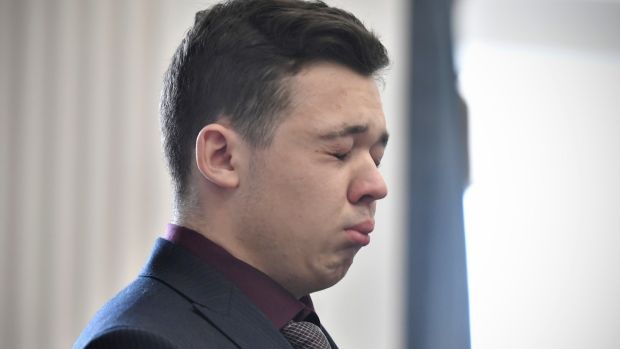 Kyle Rittenhouse closes his eyes and cries as he is found not guilty on all counts at the Kenosha County Courthouse. Photograph: Sean Krajacic - Pool/Getty