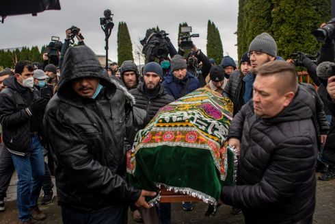 Mourners carry the coffin during the funeral of Yemeni migrant Mustafa Mohammed Murshed Al-Raimi in the village of Bohoniki, near the Polish-Belarusian border, eastern Poland, on Sunday. Photograph: Martin Divisek/EPA
