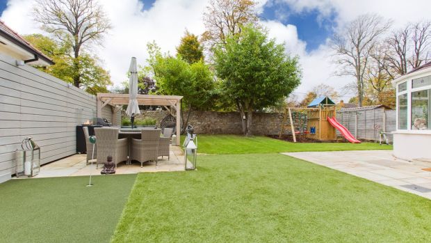 Rear garden with terrace, barbecue and playground