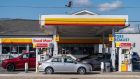 Customers fill up at a Shell gas station in Arlington, Virginia on Tuesday. Photograph: Andrew Caballero Reynolds/AFP   
