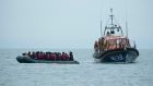 At least 27 people drown after migrant boat sinks in English Channel
