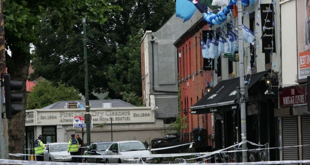 Gardaí  at the scene of a triple shooting at the Player’s Lounge in Fairview,  Dublin, in July 2010. Photograph: Eric Luke 