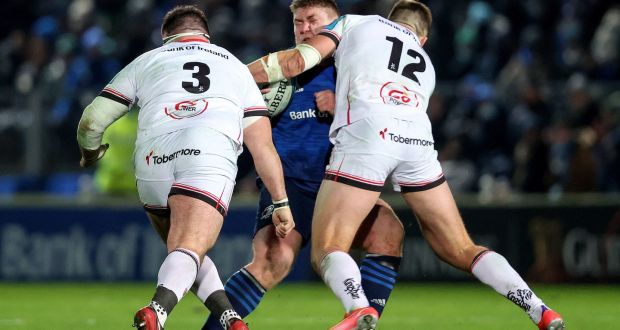Leinster’s Tadhg Furlong is tackled by Ulster’s Stuart McCloskey  during the URC clash at the RDS. Photograph: Bryan Keane/Inpho 