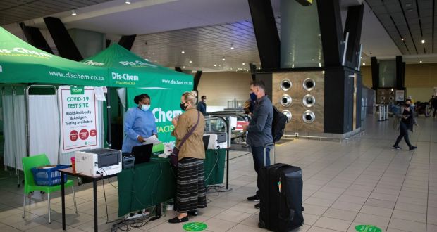 Passengers get tested for Covid-19 at OR Thambo International Airport in Johannesburg as restrictions on international flights from South Africa started to take effect  after the announcement by local scientists of the new Omicron variant. Photograph: Kim Kudbrook/EPA