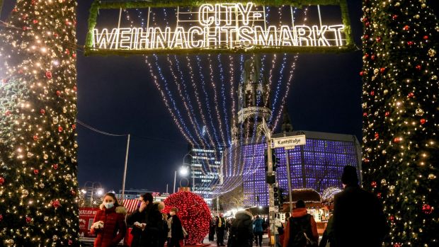 Breitscheid Square Christmas market in Berlin: After marking 100,000 Covid-19 deaths on Friday, Germany registered its first cases of the Omicron variant on Saturday. Photograph: Filip Singer