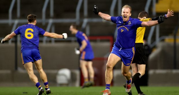 St Finbarrs’ Michael Shields celebrates at the final whistle. Photo: James Crombie/Inpho