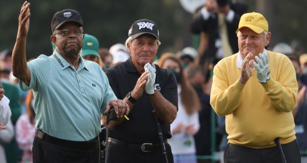 Honorary starter Lee Elder (L) is acknowledged by the crowd along with Gary Player and Jack Nicklaus at the start of the first round of the 2021 Masters. Photo: Justin Lane/EPA