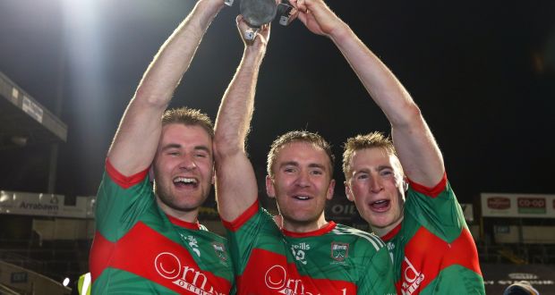 John McGrath, Noel McGrath and Brian McGrath of Loughmore-Castleiney celebrate with the cup after the county final win over Thurles Sarsfields at Semple Stadium. Photograph: Lorraine O’Sullivan/Inpho