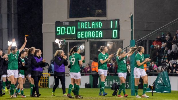 Republic of Ireland’s players celebrate with a record scoreline in the background at Tallaght Stadium on Tuesday. Photograph: Morgan Treacy/Inpho