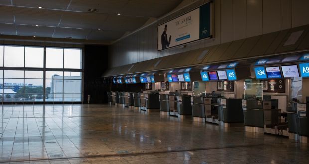 Unused check-in counters due to cancelled flights at South Africa’s OR Tambo International Airport as restrictions on international flights from the country start to take effect. Photograph: Kim Ludbrook/EPA
