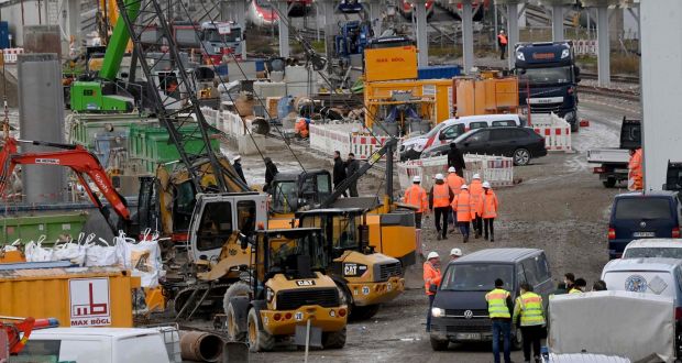 Fire brigades and policemen work at the site of a bomb explosion close to the main railway station in Munich, Germany. Photograph: CHRISTOF STACHE/AFP via Getty Images