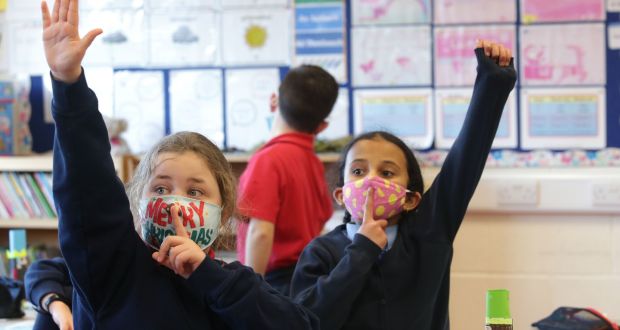 Pupils in third class at St Etchen’s National School in Kinnegad, Co Westmeath, on the first day the wearing of face masks in primary schools became mandatory. Photograph: Damien Eagers