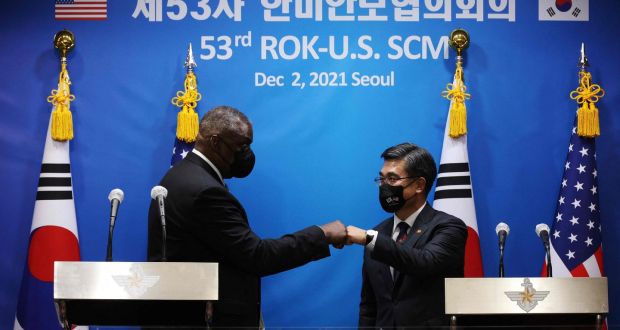 US defence secretary Lloyd Austin bumps fists with South Korean defence minister Suh Wook after a news conference  in Seoul on Thursday. Photograph:   Kim Hong-Ji/POOL/AFP via Getty Images