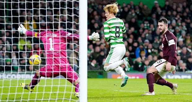 Celtic’s Kyogo Furuhashi scores their  goal during the Scottish  Premiership match against Hearts  at Celtic Park. Photograph:  Jane Barlow/PA Wire