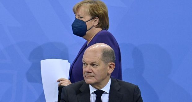 German Chancellor Angela Merkel and her designated successor, Olaf Scholz. Photograph: John Macdougall/Pool/AFP via Getty
