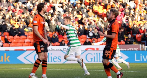 Liam Scales celebrates scoring Celtic’s  third goal  during the  Premiership match against Dundee United at Tannadice Park. Photograph:  Steve Welsh/PA Wire