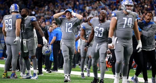 The Detroit Lions celebrate victory over the Minnesota Vikings. Photograph:  Rey Del Rio/Getty Images