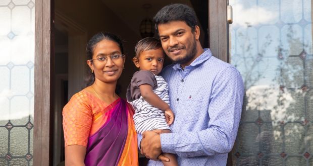 New to the Parish: Anupriyadarshini Iniyan with her husband, Iniyan Balakrishnan, and son, Iyan Maran. Photograph: Patrick Browne
