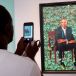 Visitors view the official portrait of former president Barack Obama by Kehinde Wiley at the Art Institute of Chicago on June 18th, 2021. Photograph:  Scott Olson/Getty Images