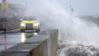  A Civil Defence 4x4 on the Woodenbridge to Dollymount, as Storm Barra hits the coast in Dublin. Photograph: Dara Mac Dónaill 