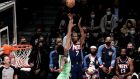 Brooklyn Nets forward Kevin Durant shoots over Minnesota Timberwolves forward Josh Okogie. Photograph: Peter Foley/EPA