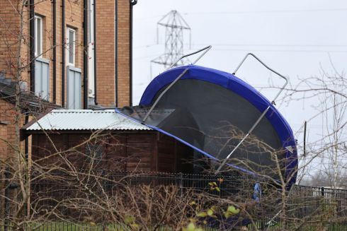 BOUNCED OUT: An overturned trampoline at a house at Clon Elagh, Derry, after Storm Barra arrived with strong winds and heavy rain. Photograph: Liam McBurney/PA Wire
