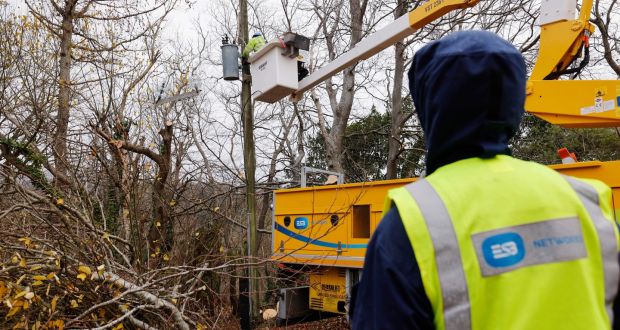  ESB crew removing and replacing a damaged single phase transformer near Fassaroe, Co Wicklow.  Photograph: Alan Betson