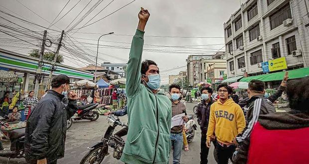 Protesters march through the streets during an anti-government demonstration in Mandalay, Myanmar. Photograph: AP
