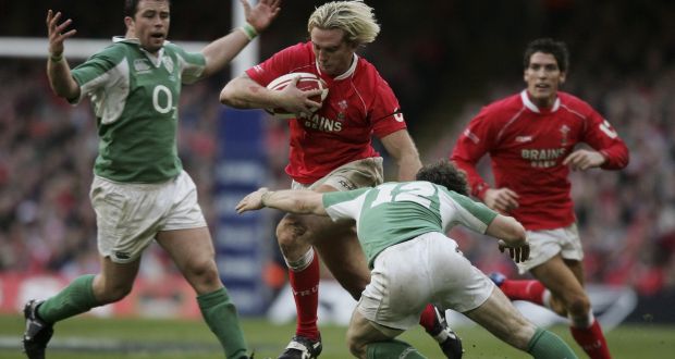 Alix Popham of Wales is tackled by Gordon D’Arcy during the Six Nations match in 2007. Photo: David Rogers/Getty Images