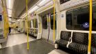 An empty early-morning Tube carriage in London as new Covid-19 restrictions were introduced in England. Stock markets were lower on Thursday amid Covid concerns. Photograph: Martin Keene/PA