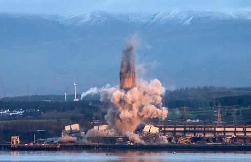 POWER DOWN: The 600ft-high chimney stack at Longannet Power Station in Fife is brought down by controlled explosion. Photograph: Jane Barlow/PA Wire

