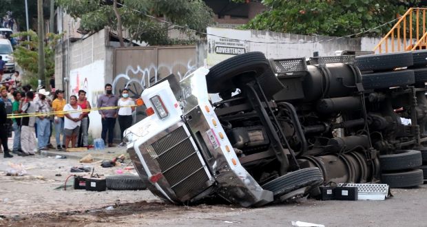 The container of the lorry was smashed open by the force of the impact. Photograph: Alfredo Pacheco/Getty Images