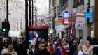 Shoppers, some wearing face coverings to combat the spread of the coronavirus, on Oxford Street in central London on Friday. Photograph:  Niklas Halle’n/AFP via Getty Images