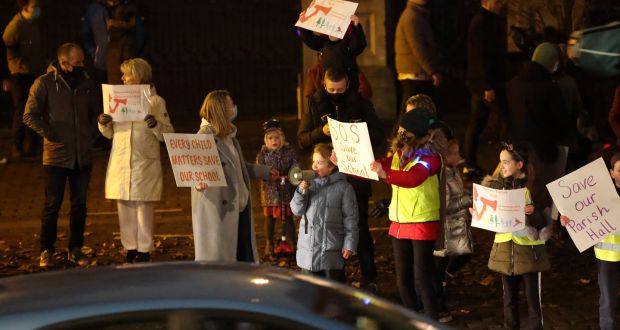 Local organisations held a protest on Thursday night outside the Archbishop’s Palace on the Drumcondra Road, appealing to be permitted back into the hall. Photograph: Dara Mac Dónaill