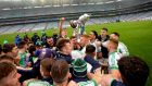 Ballyhale Shamrocks’ Colin Fennelly celebrates with the trophy and his teammates after they won the Leinster title. Photo: Ryan Byrne/Inpho