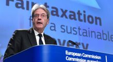 ‘What we are introducing is a ceiling, a limit, on the race to the bottom,’ said EU economy commissioner Paolo Gentiloni. Photograph: John Thys/AFP via Getty