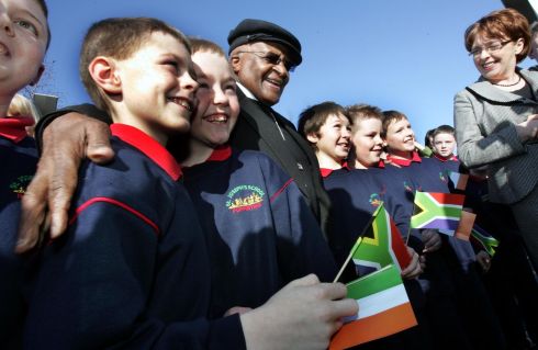 2009-Archbishop Desmond Tutu with pupils from St. Josephs School at the launch of the Music Room, a Ballymun Regeneration project in Ballymun, Co. Dublin.
Photograph: Eric Luke The Irish Times

