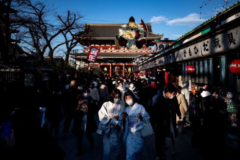 BLUE SKIES: Shoppers near Sensoji Temple in Tokyo, Japan. Photograph: Philip Fong/AFP via Getty