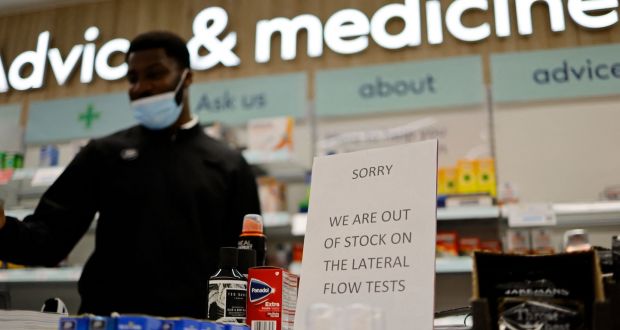 A sign in  a chemist’s shop in northeast London telling customers that the pharmacy is out of   lateral flow antigen tests.  Photograph:  Tolga Akmen/AFP via Getty Images