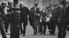 Fr Edward Daly runs down the street with an injured man on Bloody Sunday, January 30th, 1972.
