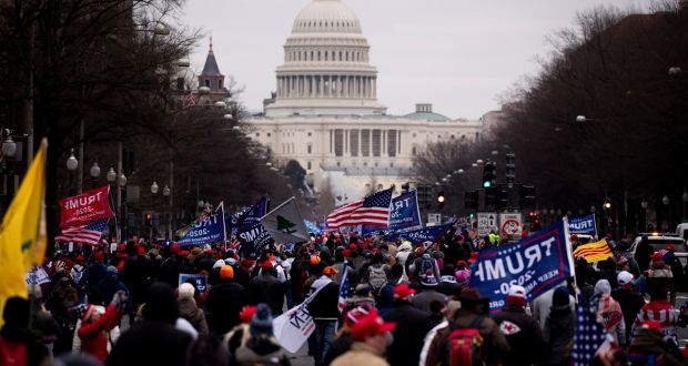  Pro-Trump protesters marching towards  the US Capitol  in Washington DC  on January 6th, 2021. The defeated US president had  refused to concede  victory to Joe Biden, claiming voter fraud and rigged elections. Photograph:  EPA/Michael Reynolds 