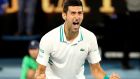 Novak Djokovic celebrates after winning against Russia’s Daniil Medvedev in the 2021  Australian Open in Melbourne. Photograph:  David Gray / AFP via Getty Images