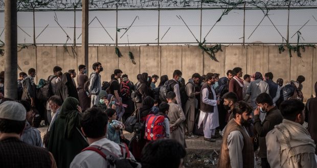 August 2021: People hoping to gain access to Kabul airport gather outside it during mass evacuations from Afghanistan. Photograph: Jim Huylebroek/New York Times
