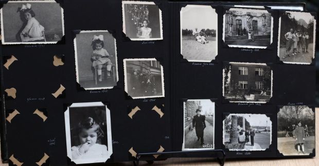 Oliver Sears’s photo album containing images of his mother Monika when she was in the Warsaw ghetto in 1941. Photograph: Laura Hutton/The Irish Times