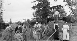 Convalescent soldiers helping the women and children with haymaking, Great Dixter, East Sussex, 1916. Photograph: English Heritage/Heritage Images/Getty