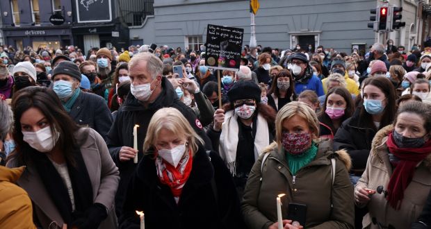 A crowd attends a vigil for  teacher Ashling Murphy outside Leinster House. Photograph: Laura Hutton/The Irish Times