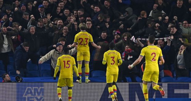 Conor Gallagher celebrates in front of the Palace fans after scoring against Brighton at the American Express Community Stadium. Photograph: Getty Images